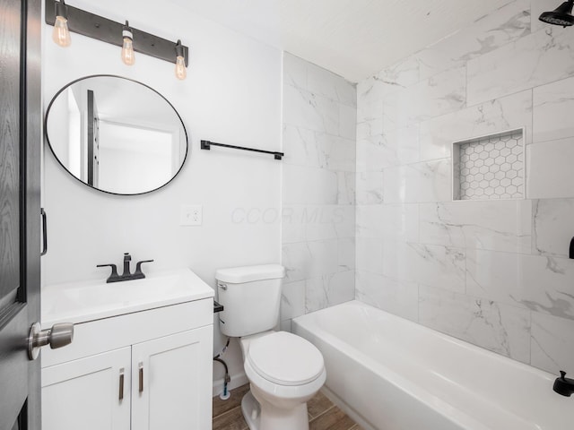 full bathroom with vanity, shower / bathing tub combination, toilet, and wood finished floors