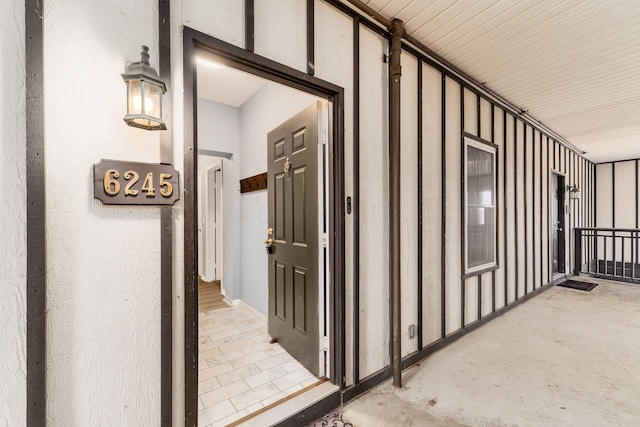 hallway featuring concrete floors