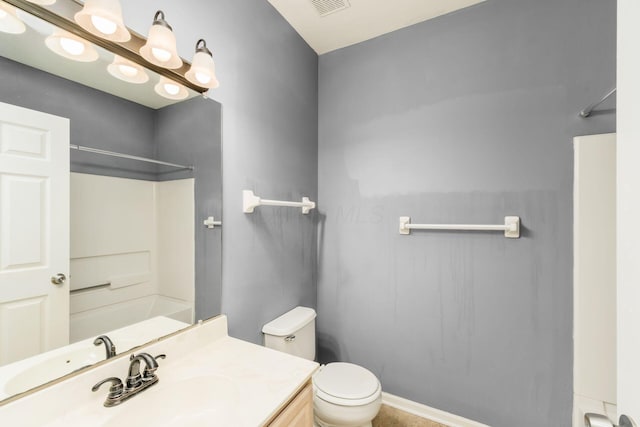 bathroom with visible vents, toilet, and vanity