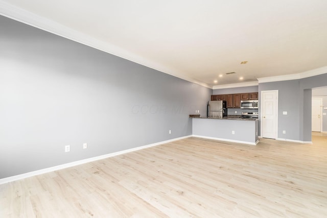 unfurnished living room with recessed lighting, light wood-style flooring, crown molding, and baseboards