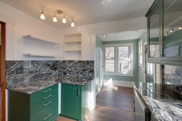 kitchen featuring decorative backsplash, open shelves, green cabinets, and dark wood-style flooring