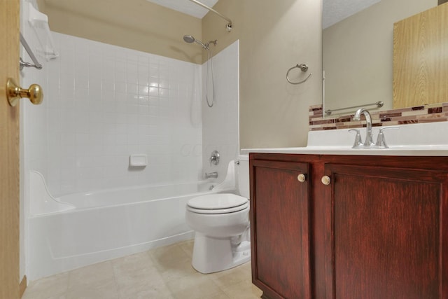 full bathroom featuring tile patterned floors, toilet, a textured ceiling, bathing tub / shower combination, and vanity