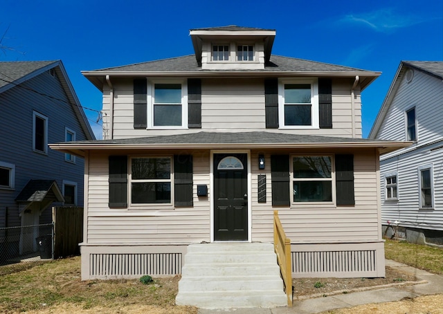 traditional style home with fence