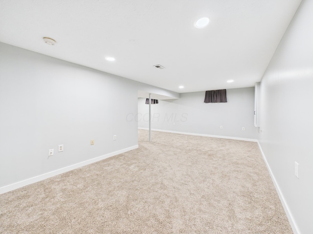 finished below grade area featuring recessed lighting, baseboards, and carpet floors