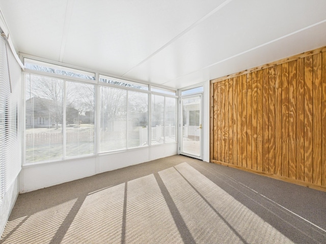 unfurnished sunroom featuring a wealth of natural light