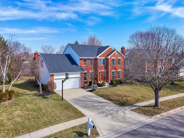 view of front of home featuring a garage, a front yard, brick siding, and a chimney