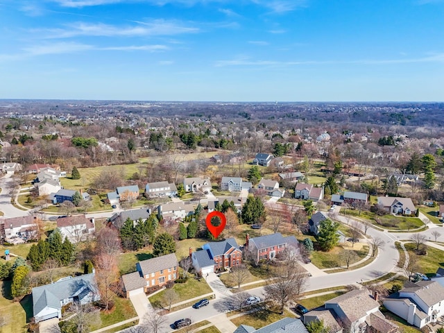 birds eye view of property with a residential view