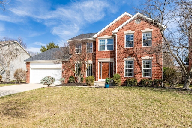 colonial-style house with brick siding, a front lawn, concrete driveway, and an attached garage