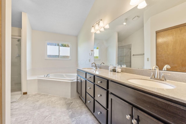 full bath with a sink, visible vents, a bath, and a shower stall