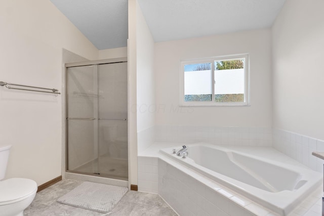 full bath featuring toilet, a textured ceiling, a shower stall, baseboards, and a bath