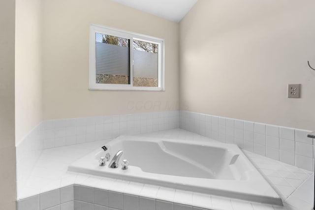 bathroom with a garden tub