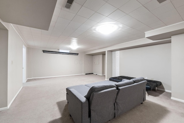 living room with visible vents, baseboards, and carpet