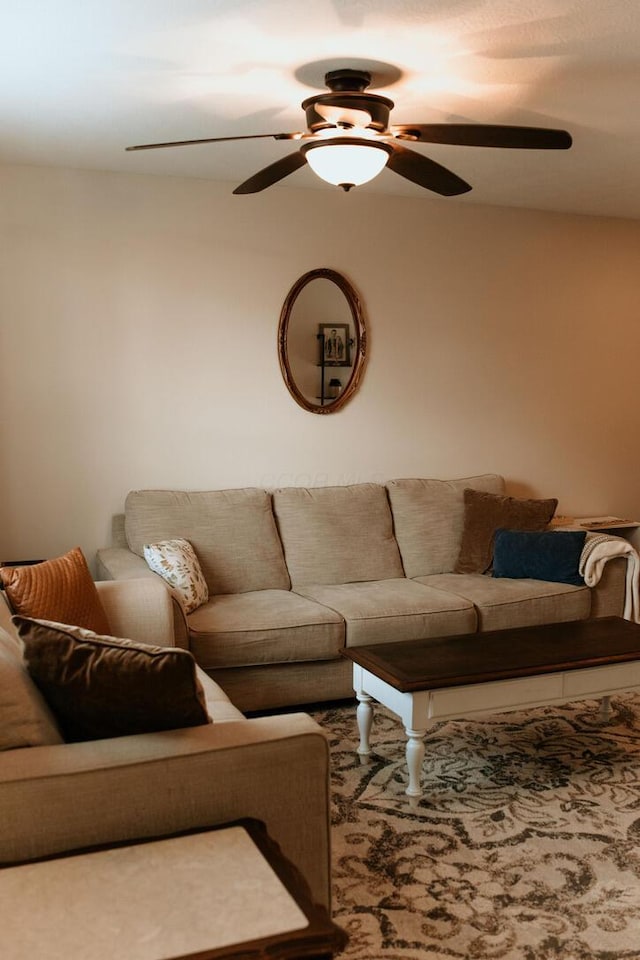 living area with ceiling fan