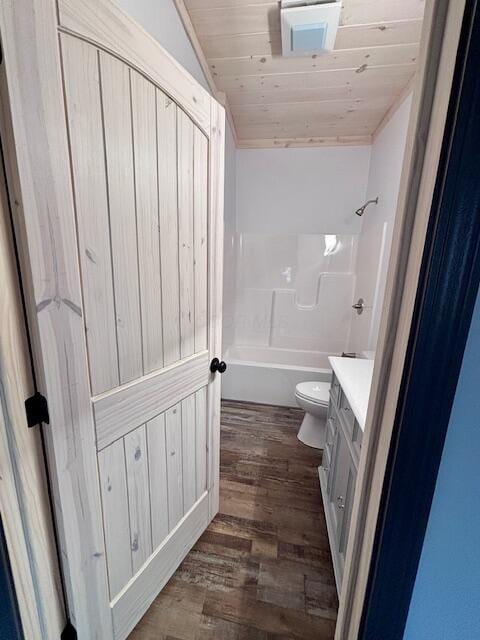 full bathroom featuring toilet, wooden ceiling, shower / bathing tub combination, wood finished floors, and vanity