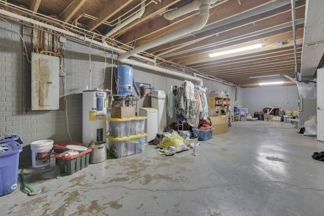 unfinished basement with water heater and electric panel