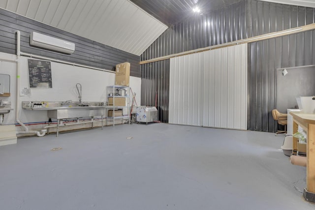 garage featuring metal wall and a wall mounted air conditioner