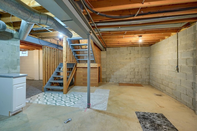 unfinished basement with stairway