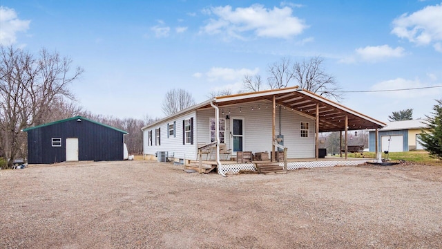 view of front facade with an outbuilding