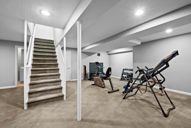 exercise room featuring recessed lighting, baseboards, and carpet floors