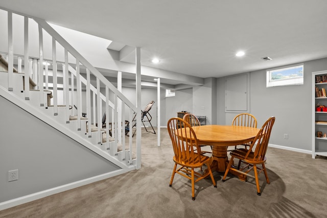 carpeted dining space featuring stairs, visible vents, recessed lighting, and baseboards