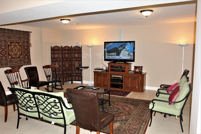 6884 Ballantrae Pl, Dublin, OH 43016 - living room featuring tile patterned floors and baseboards