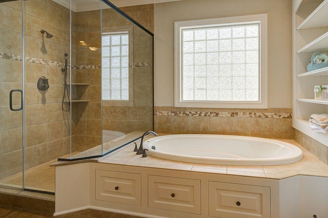 6884 Ballantrae Pl, Dublin, OH 43016 - bathroom featuring a bath and a shower stall