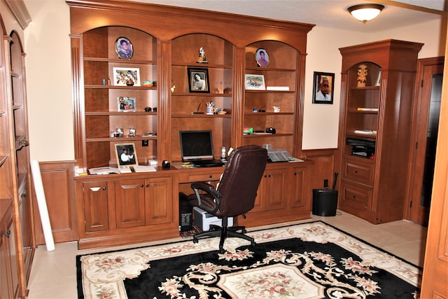 6884 Ballantrae Pl, Dublin, OH 43016 - office with light tile patterned floors, wainscoting, and built in study area