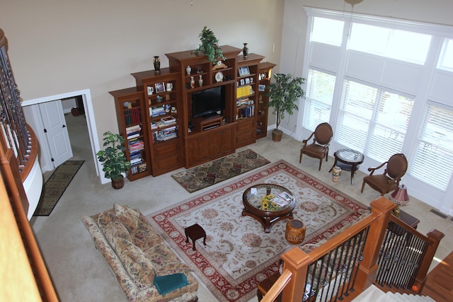 6884 Ballantrae Pl, Dublin, OH 43016 - living room with visible vents and a towering ceiling
