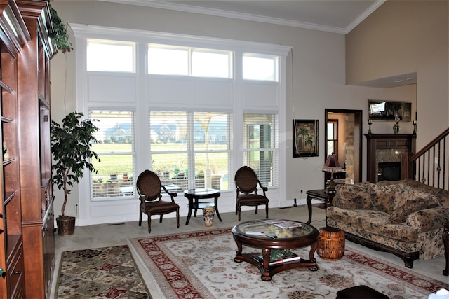 6884 Ballantrae Pl, Dublin, OH 43016 - living room with a wealth of natural light, a towering ceiling, and crown molding