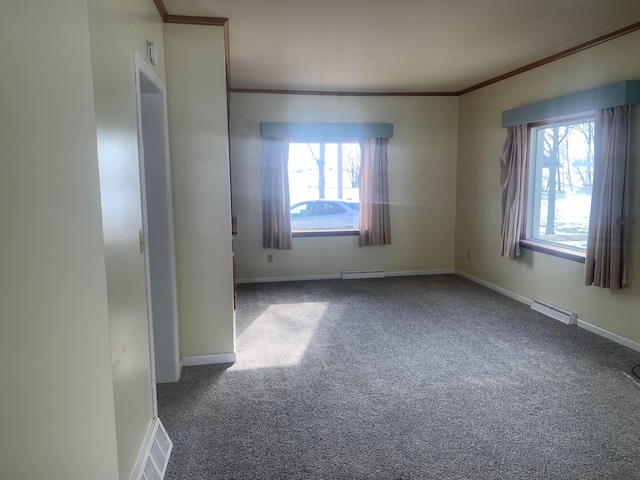 empty room featuring carpet flooring, visible vents, and ornamental molding