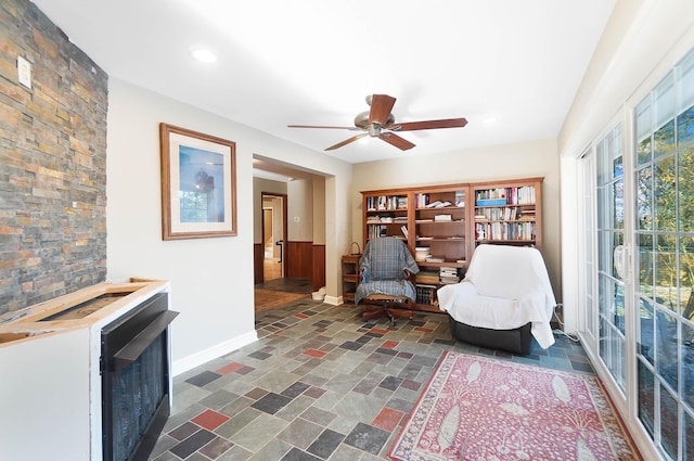 unfurnished room featuring recessed lighting, baseboards, stone finish flooring, and ceiling fan