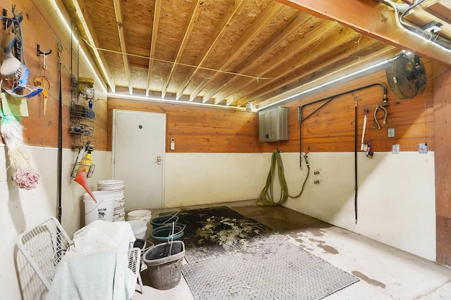 miscellaneous room with unfinished concrete floors