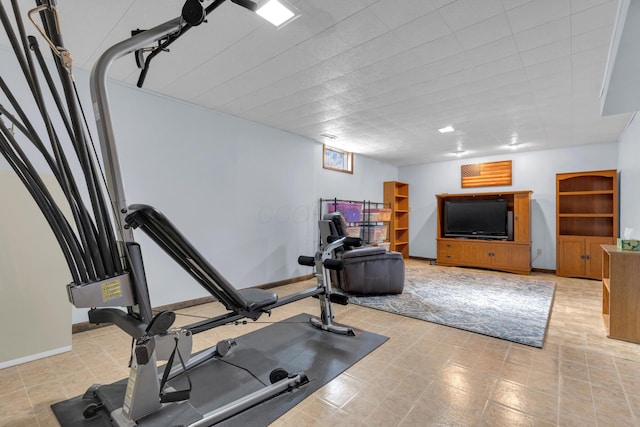 exercise area with baseboards