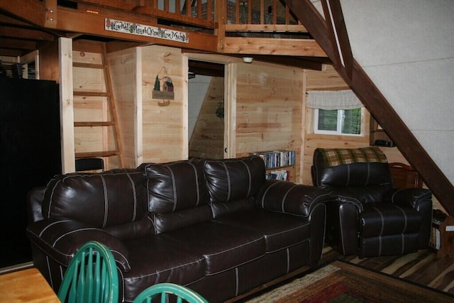 home theater featuring wooden walls