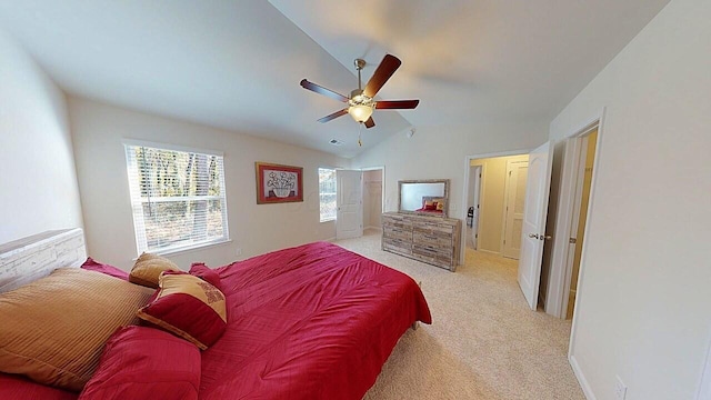 45 Genoa Cir, Commercial Point, OH 43116 - bedroom with light colored carpet, vaulted ceiling, ceiling fan, and baseboards