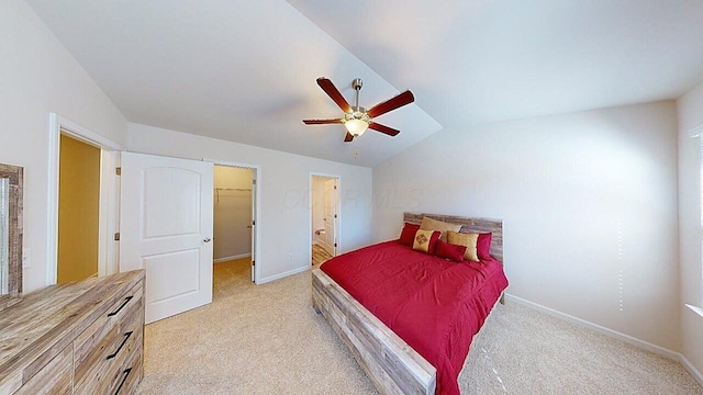 45 Genoa Cir, Commercial Point, OH 43116 - bedroom featuring light carpet, lofted ceiling, baseboards, a spacious closet, and a ceiling fan