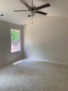 45 Genoa Cir, Commercial Point, OH 43116 - unfurnished room with carpet flooring, baseboards, and a ceiling fan