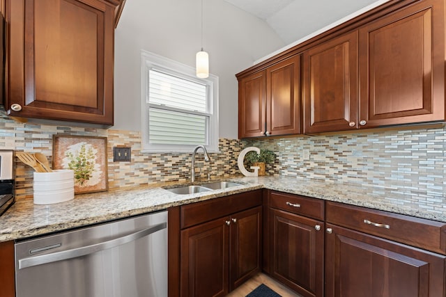 kitchen featuring stainless steel dishwasher, a sink, light stone countertops, vaulted ceiling, and backsplash