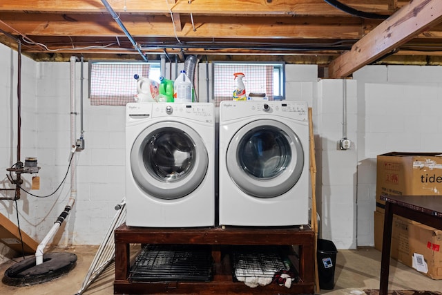 clothes washing area with washer and dryer