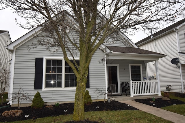 view of front of property featuring covered porch