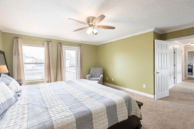 bedroom with a textured ceiling, carpet, baseboards, ornamental molding, and a ceiling fan