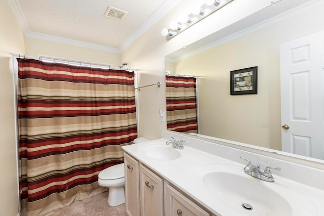 bathroom with double vanity, visible vents, toilet, and a sink