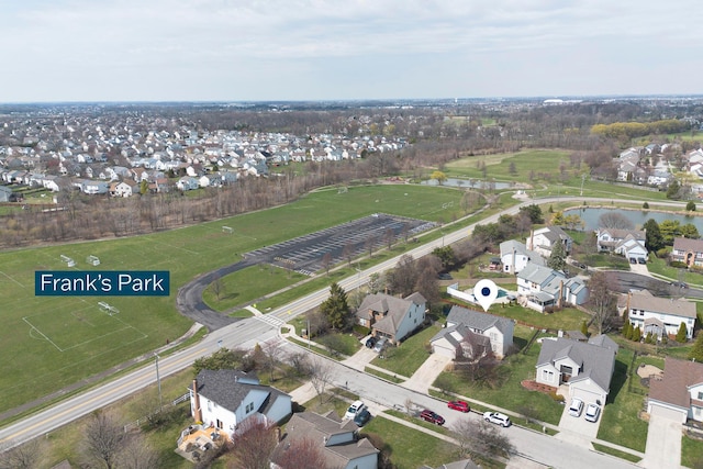 aerial view featuring a residential view and a water view