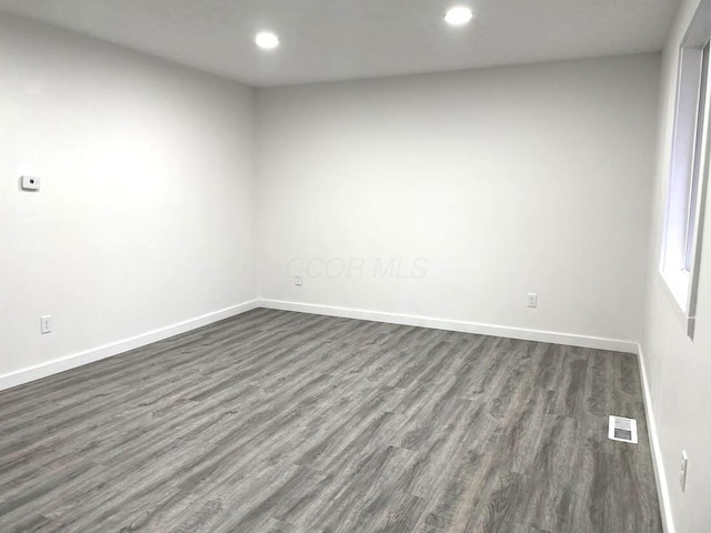 1616 Koebel Rd, Columbus, OH 43207 - empty room featuring recessed lighting, visible vents, baseboards, and dark wood-type flooring