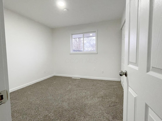 1616 Koebel Rd, Columbus, OH 43207 - unfurnished bedroom with baseboards and carpet floors