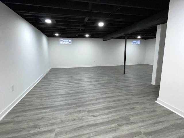 1616 Koebel Rd, Columbus, OH 43207 - basement with baseboards and wood finished floors
