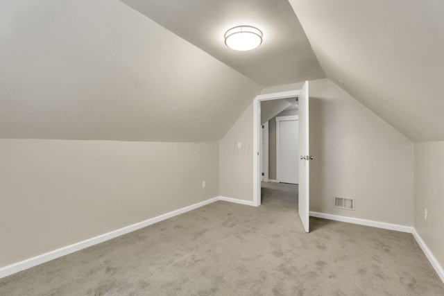 681 Stewart Ave, Columbus, OH 43206 - bonus room with visible vents, carpet floors, baseboards, and lofted ceiling