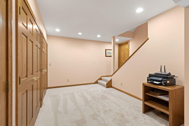 1299 Stratford Woods Dr, Newark, OH 43055 - finished below grade area featuring light colored carpet, stairway, recessed lighting, and baseboards