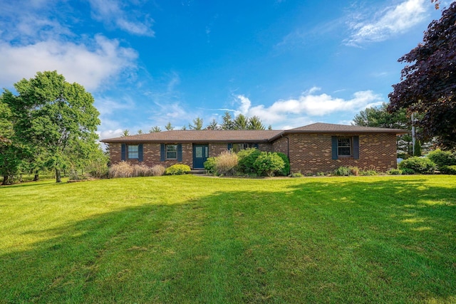 7704 Old Tarlton Pike, Circleville, OH 43113 - single story home featuring brick siding and a front lawn