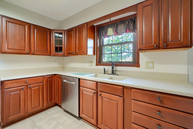 7704 Old Tarlton Pike, Circleville, OH 43113 - kitchen with a sink, stainless steel dishwasher, light countertops, and decorative backsplash